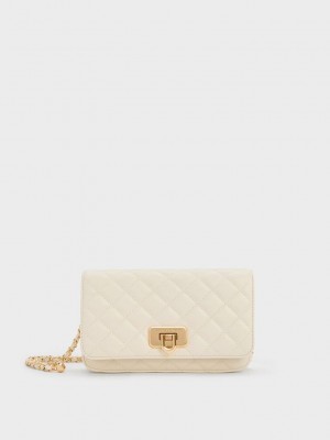 Charles & Keith Cressida Kapitone Push-Lock Clutch Krema | UJRZ-89057