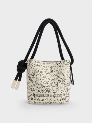 Charles & Keith Gwiana Knotted Printed Bucket Bag Krema | NMSE-24580