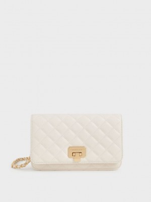 Charles & Keith Kapitone Push-Lock Clutch Krema | IDUW-29375